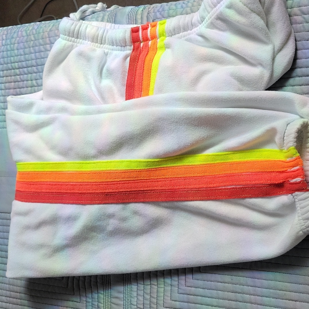 Aviator Nation Vintage white sweatpants with neon stripes.